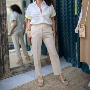 Please pantalon avec un liseret sur les poches « fluo »